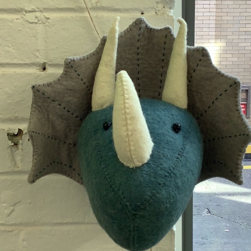 Dinosaur head wall decor
